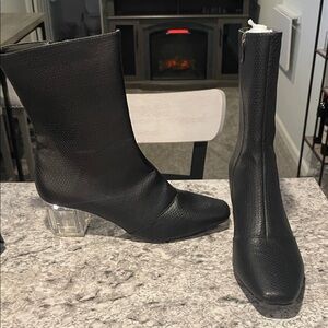 Chic Black Heeled Boots with Clear Heel